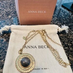 New and never worn. Anna Beck stunning gold necklace with stone. 18k gold.